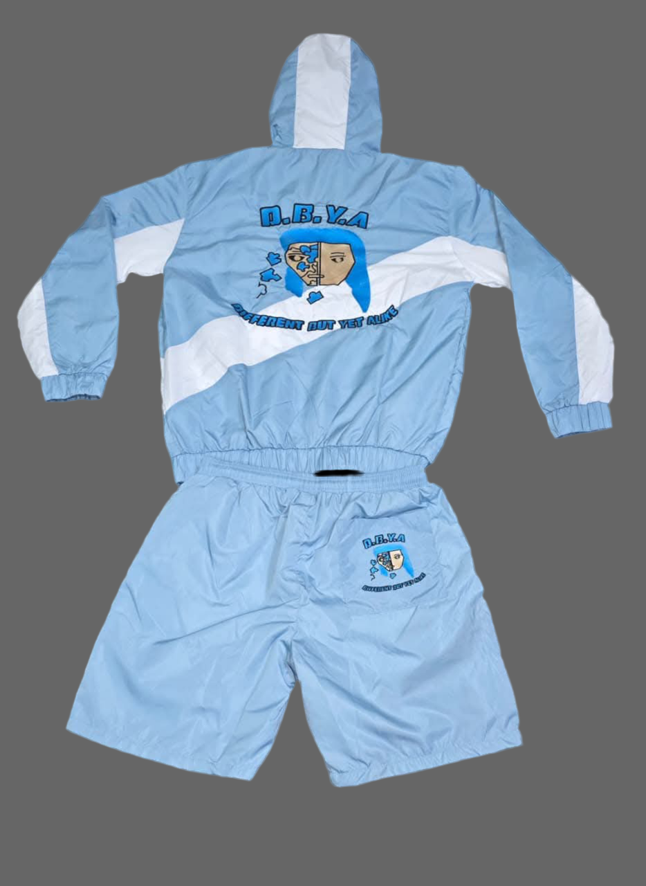 Light blue tracksuit with white accents on a gray background